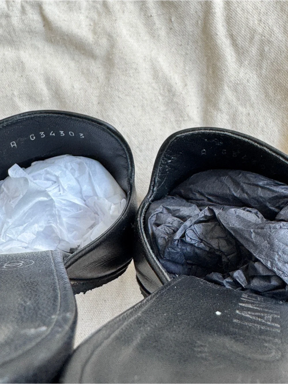 CHANEL leather mules